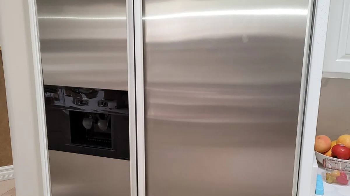 Factory-certified appliance repair technician servicing luxury refrigeration, laundry suites, and cooking ranges in Los Altos, CA